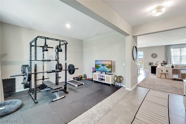 43837 Cattleman Dr, Punta Gorda, FL 33982 - workout room featuring baseboards