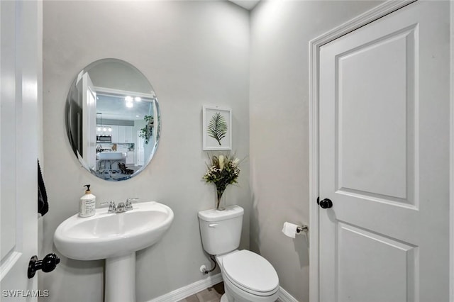 43837 Cattleman Dr, Punta Gorda, FL 33982 - half bathroom featuring toilet and a sink