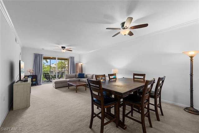 8550 Kingbird Loop Unit 629, Estero, FL 33967 - carpeted dining room featuring ceiling fan and ornamental molding