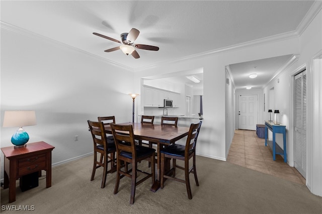 8550 Kingbird Loop Unit 629, Estero, FL 33967 - dining area with ceiling fan, light colored carpet, ornamental molding, and light tile patterned floors