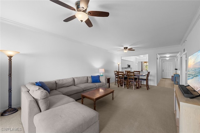 8550 Kingbird Loop Unit 629, Estero, FL 33967 - living area with a ceiling fan, light carpet, and crown molding