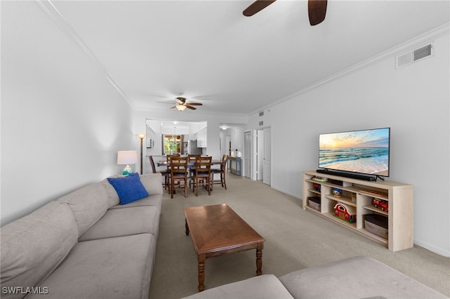 8550 Kingbird Loop Unit 629, Estero, FL 33967 - living area with a ceiling fan, ornamental molding, and light carpet
