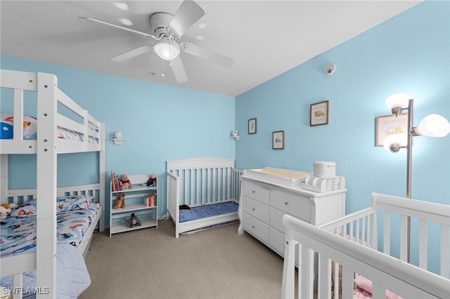 8550 Kingbird Loop Unit 629, Estero, FL 33967 - bedroom featuring carpet flooring, a nursery area, and a ceiling fan