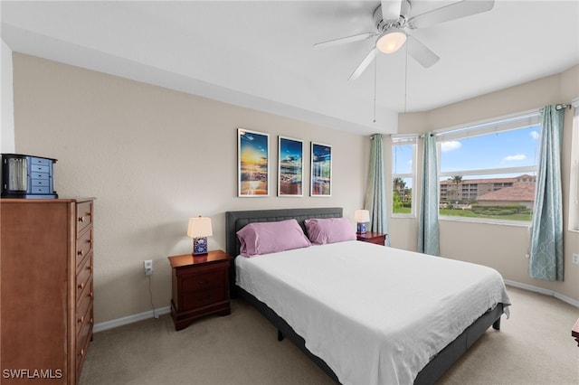 8550 Kingbird Loop Unit 629, Estero, FL 33967 - bedroom featuring light carpet and a ceiling fan