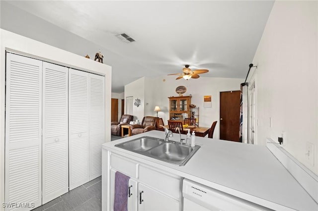 1720 NW 14th Pl, Cape Coral, FL 33993 - kitchen with dishwasher, a ceiling fan, light countertops, vaulted ceiling, and dark tile patterned floors