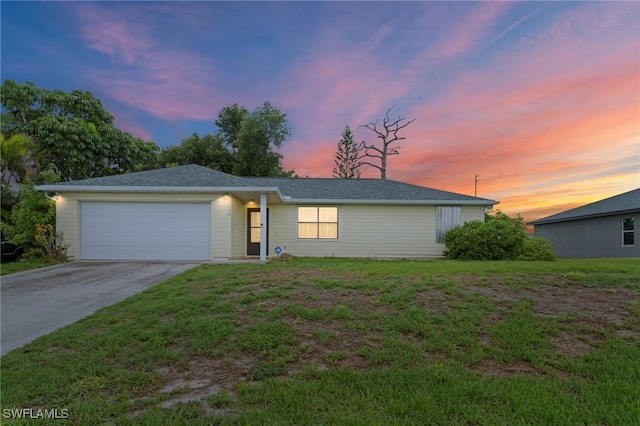 1720 NW 14th Pl, Cape Coral, FL 33993 - single story home featuring a garage, concrete driveway, and a lawn