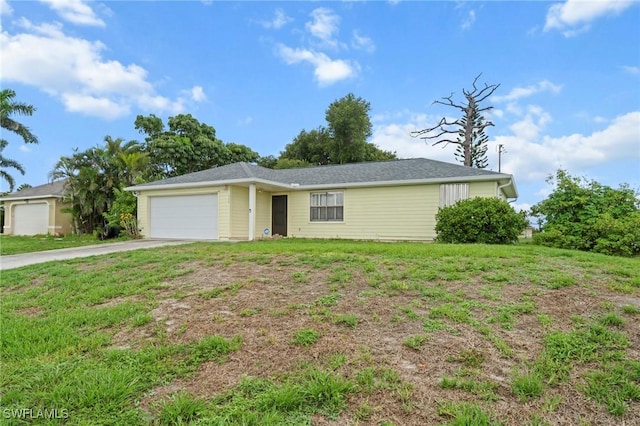 1720 NW 14th Pl, Cape Coral, FL 33993 - single story home featuring an attached garage, driveway, and a front lawn