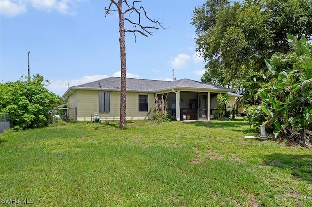 1720 NW 14th Pl, Cape Coral, FL 33993 - back of house with a sunroom