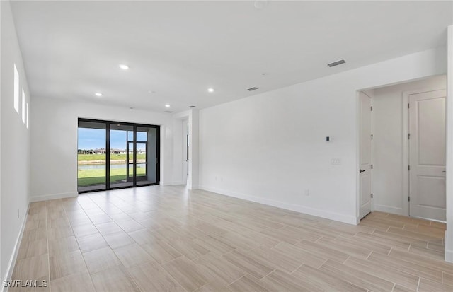 6144 Liberty St, Ave Maria, FL 34142 - unfurnished room with recessed lighting and light wood-type flooring