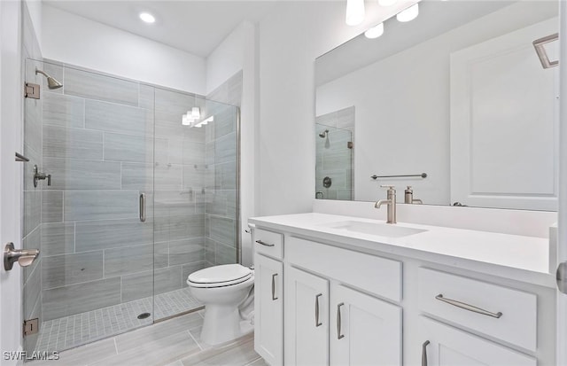 6144 Liberty St, Ave Maria, FL 34142 - full bathroom with vanity, a shower stall, and recessed lighting