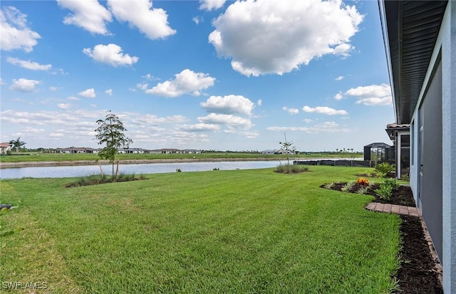 6144 Liberty St, Ave Maria, FL 34142 - view of grassy yard featuring a water view