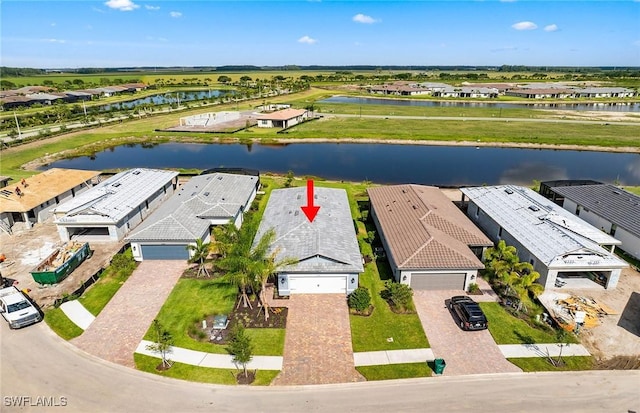 6144 Liberty St, Ave Maria, FL 34142 - aerial perspective of suburban area with a nearby body of water