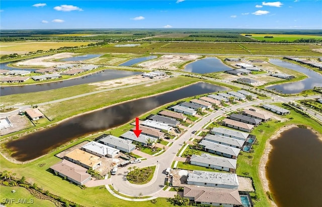 6144 Liberty St, Ave Maria, FL 34142 - aerial view of property and surrounding area with a nearby body of water and nearby suburban area
