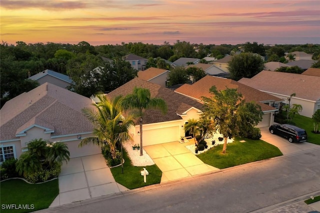 9795 Gladiolus Bulb Loop, Fort Myers, FL 33908 - aerial view at dusk
