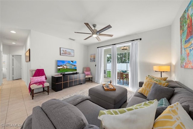 9795 Gladiolus Bulb Loop, Fort Myers, FL 33908 - tiled living room with ceiling fan and recessed lighting