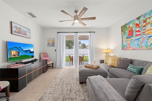 9795 Gladiolus Bulb Loop, Fort Myers, FL 33908 - living area featuring ceiling fan and tile patterned flooring