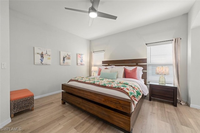 9795 Gladiolus Bulb Loop, Fort Myers, FL 33908 - bedroom featuring light wood-style flooring and a ceiling fan