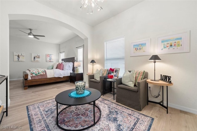 9795 Gladiolus Bulb Loop, Fort Myers, FL 33908 - bedroom with arched walkways and wood finished floors