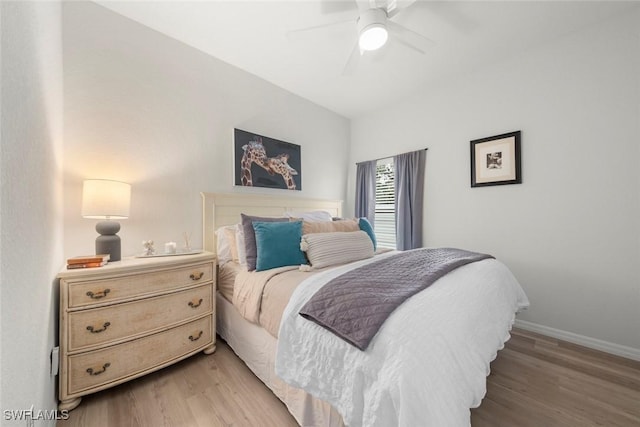 9795 Gladiolus Bulb Loop, Fort Myers, FL 33908 - bedroom featuring light wood-style floors and ceiling fan