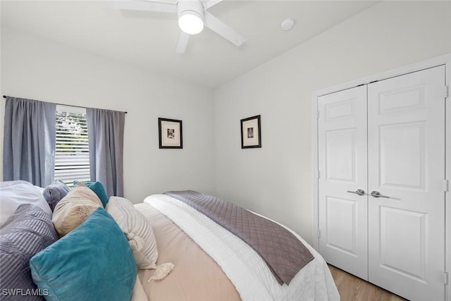 9795 Gladiolus Bulb Loop, Fort Myers, FL 33908 - bedroom featuring light wood-style floors, a closet, and ceiling fan