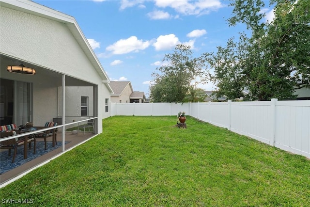 9795 Gladiolus Bulb Loop, Fort Myers, FL 33908 - fenced backyard featuring a patio