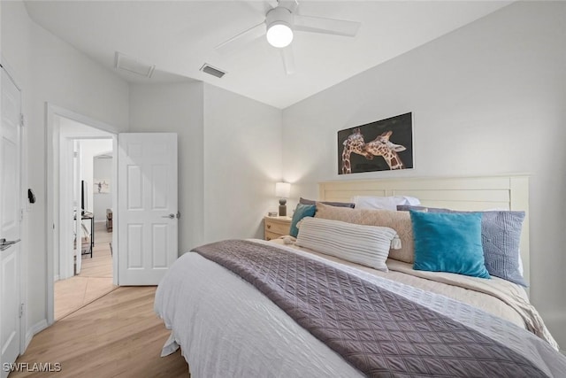 9795 Gladiolus Bulb Loop, Fort Myers, FL 33908 - bedroom with light wood-style floors and ceiling fan