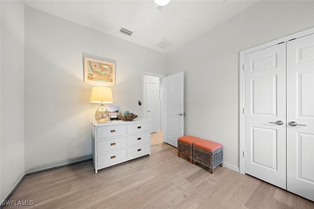 9795 Gladiolus Bulb Loop, Fort Myers, FL 33908 - bedroom with light wood-style floors and a closet