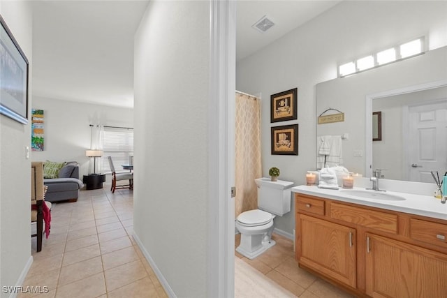 9795 Gladiolus Bulb Loop, Fort Myers, FL 33908 - bathroom featuring tile patterned floors and vanity