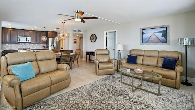 7148 Estero Blvd Unit 922, Fort Myers Beach, FL 33931 - living area featuring ceiling fan, light wood-style floors, and recessed lighting
