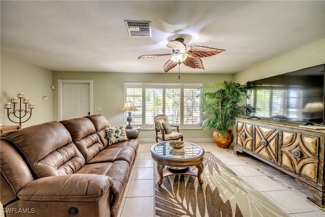 225 SW 43rd Ln, Cape Coral, FL 33914 - living room with a ceiling fan and light tile patterned floors