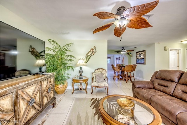 225 SW 43rd Ln, Cape Coral, FL 33914 - living area with light tile patterned flooring and a ceiling fan