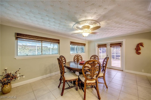 225 SW 43rd Ln, Cape Coral, FL 33914 - dining room featuring french doors, light tile patterned flooring, ceiling fan, and ornamental molding