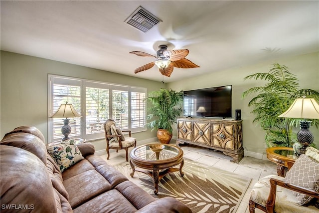 225 SW 43rd Ln, Cape Coral, FL 33914 - living room featuring light tile patterned floors and ceiling fan