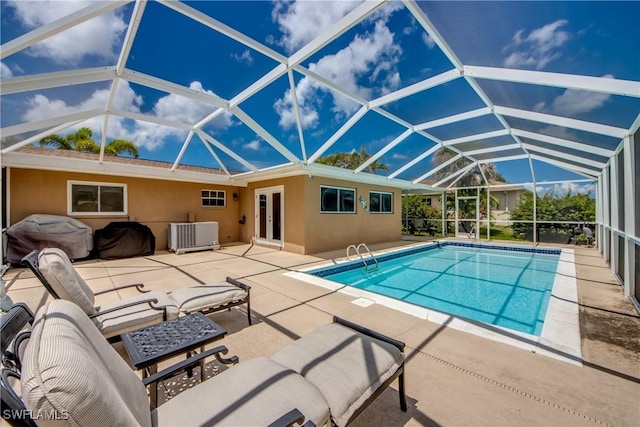 225 SW 43rd Ln, Cape Coral, FL 33914 - outdoor pool with a patio area, area for grilling, and a lanai