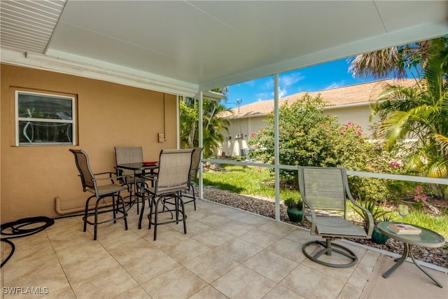 225 SW 43rd Ln, Cape Coral, FL 33914 - sunroom with outdoor dining space