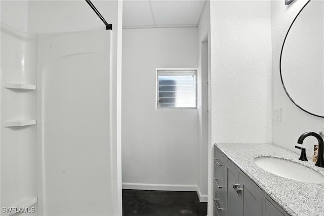 131 Bay Mar Dr, Fort Myers Beach, FL 33931 - full bathroom with a paneled ceiling and vanity