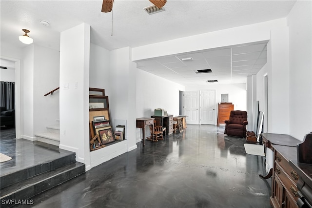 131 Bay Mar Dr, Fort Myers Beach, FL 33931 - garage featuring ceiling fan and baseboards