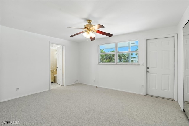 131 Bay Mar Dr, Fort Myers Beach, FL 33931 - spare room featuring light carpet and ceiling fan