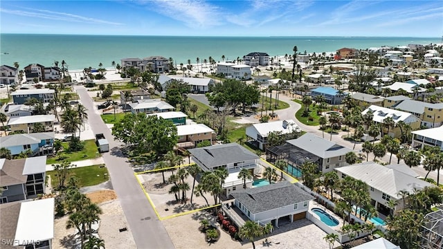 131 Bay Mar Dr, Fort Myers Beach, FL 33931 - bird's eye view of a large body of water and a pool area