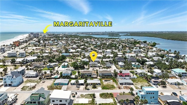 131 Bay Mar Dr, Fort Myers Beach, FL 33931 - aerial perspective of suburban area with a large body of water