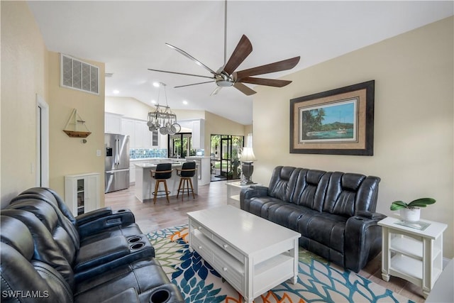 15878 Gleneagle Ct, Fort Myers, FL 33908 - living room featuring a ceiling fan, lofted ceiling, light wood-style flooring, and recessed lighting