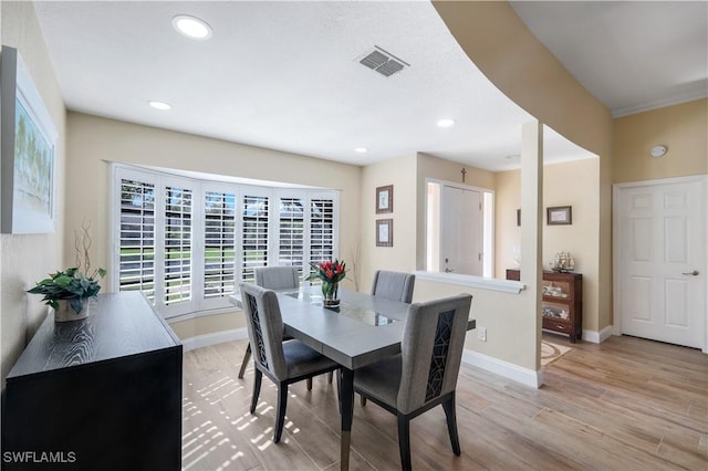 15878 Gleneagle Ct, Fort Myers, FL 33908 - dining room featuring light wood-style floors and recessed lighting