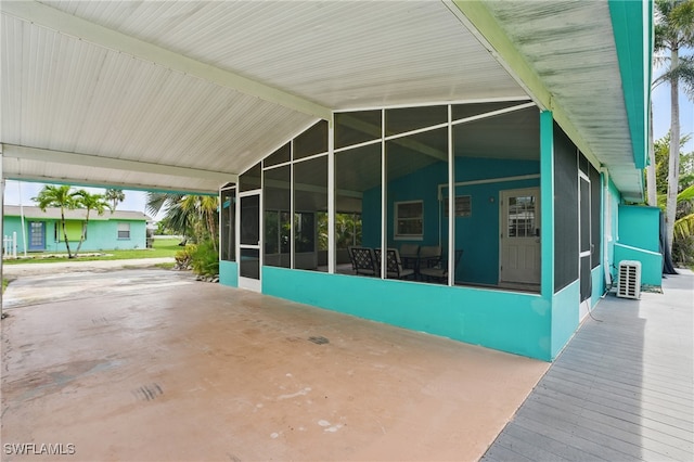 7434 Cares Away Park Cir, Bokeelia, FL 33922 - view of patio with a sunroom