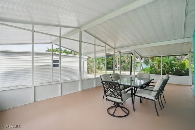 7434 Cares Away Park Cir, Bokeelia, FL 33922 - sunroom / solarium with lofted ceiling and outdoor dining space