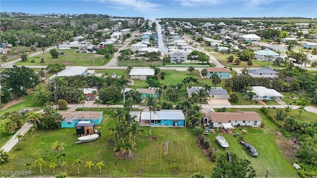 7434 Cares Away Park Cir, Bokeelia, FL 33922 - aerial overview of property's location with nearby suburban area