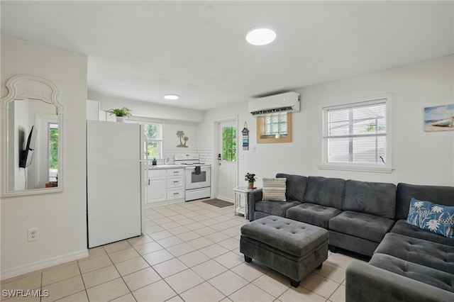 7434 Cares Away Park Cir, Bokeelia, FL 33922 - living area featuring a wall mounted air conditioner and light tile patterned floors