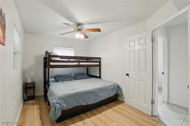 7434 Cares Away Park Cir, Bokeelia, FL 33922 - bedroom featuring ceiling fan and wood finished floors