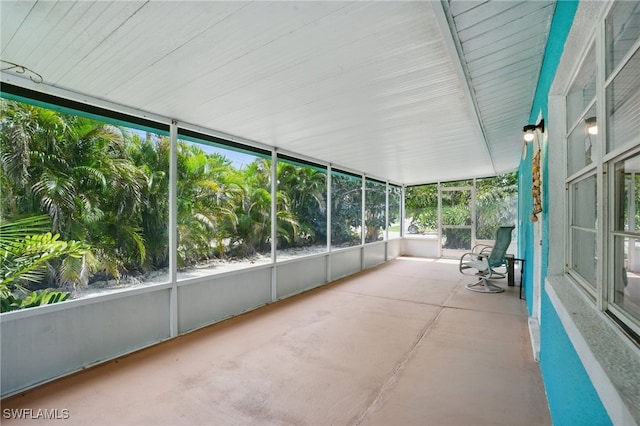 7434 Cares Away Park Cir, Bokeelia, FL 33922 - unfurnished sunroom with plenty of natural light