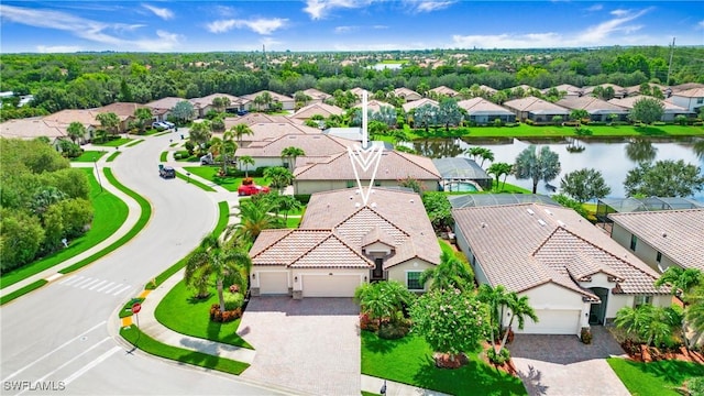 3668 Treasure Cove Ct, Naples, FL 34114 - aerial view of residential area featuring a large body of water