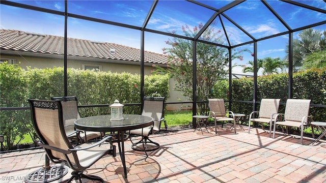 3668 Treasure Cove Ct, Naples, FL 34114 - view of patio featuring glass enclosure